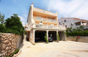 Apartments with a parking space Barbat, Rab - 5002  Раб